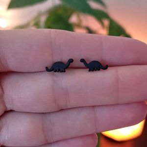 Tiny dino earrings black matte dinosaur studs